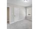 Clean bedroom with fresh paint, soft carpet, a sunny window, and a convenient closet space at 2328 Edison St, Charlotte, NC 28206