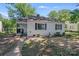 Charming single-story home featuring a classic design, a well-maintained yard, and a welcoming front porch at 2328 Edison St, Charlotte, NC 28206