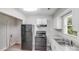 Functional kitchen with essential appliances, practical cabinetry, and a convenient sink area for easy meal prep at 2328 Edison St, Charlotte, NC 28206