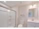 Clean bathroom with a glass-enclosed shower, white vanity, and a modern mirror at 239 Damask Dr, Lancaster, SC 29720