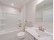 A well-lit bathroom featuring a tub-shower combo, single sink vanity, and a large mirror, ready for personal touches at 239 Damask Dr, Lancaster, SC 29720
