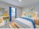 Bright, cheerful bedroom with queen sized bed, storage and bright colors at 239 Damask Dr, Lancaster, SC 29720