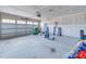 Spacious garage with an automatic door, ample storage, and a concrete floor at 239 Damask Dr, Lancaster, SC 29720