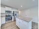Modern kitchen featuring stainless steel appliances, granite countertops and a central island at 239 Damask Dr, Lancaster, SC 29720