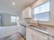 Well-lit kitchen featuring granite countertops, stainless steel appliances, and bright lighting at 239 Damask Dr, Lancaster, SC 29720