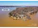 Aerial view of Lake Wylie homes highlighting waterfront properties with private docks and lakeside living at 3030 Point Clear Dr, Tega Cay, SC 29708
