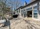 Rear exterior of home includes a large deck for relaxing with scenic lake views at 3030 Point Clear Dr, Tega Cay, SC 29708
