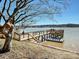 Lakefront property boasts a private dock and easy access to the water at 3030 Point Clear Dr, Tega Cay, SC 29708