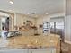 Modern kitchen with stainless steel appliances, granite countertops, and custom cabinetry at 3030 Point Clear Dr, Tega Cay, SC 29708