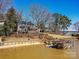 Lakefront property with a private dock and access to the water for boating and recreation at 3030 Point Clear Dr, Tega Cay, SC 29708