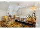 Cozy bedroom with hardwood floors, natural light, and comfortable furnishings at 341 Beckwick Ln, Concord, NC 28025