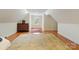 Well-lit bedroom with hardwood floors, dresser, and a large area rug at 341 Beckwick Ln, Concord, NC 28025