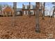 Traditional brick home with well-manicured lawn and mature trees in a desirable neighborhood at 341 Beckwick Ln, Concord, NC 28025