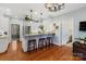Charming kitchen with granite countertops, stainless steel appliances and an island with barstool seating at 341 Beckwick Ln, Concord, NC 28025