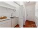 Well-equipped laundry room with ample storage space and modern appliances at 341 Beckwick Ln, Concord, NC 28025