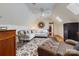 Comfortable living room with a plush sectional, skylights, and vaulted ceilings at 341 Beckwick Ln, Concord, NC 28025