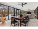 Bright sunroom with floor-to-ceiling windows showcasing views of the outdoor patio and backyard at 341 Beckwick Ln, Concord, NC 28025
