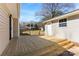 Outdoor wooden deck, perfect for entertaining, with access to the backyard and storage shed at 345 Briar Creek Rd, Gastonia, NC 28056