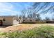 Large backyard featuring a detached garage, a mix of grass and open space at 345 Briar Creek Rd, Gastonia, NC 28056