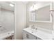 This bathroom has a stylish vanity, modern faucet, and a shower with beautiful marble tiling at 345 Briar Creek Rd, Gastonia, NC 28056