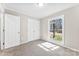 Bedroom with carpet, closet, and window at 345 Briar Creek Rd, Gastonia, NC 28056