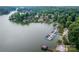 Lakefront homes featuring private docks and boat slips, nestled amidst lush trees with serene water views at 3675 West Bay Dr, Sherrills Ford, NC 28673