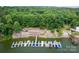 Aerial view of marina on a lake surrounded by a forest at 3675 West Bay Dr, Sherrills Ford, NC 28673