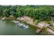 Aerial view of marina on a lake surrounded by a forest at 3675 West Bay Dr, Sherrills Ford, NC 28673