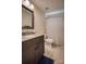 Bathroom features modern sink and vanity with tiled floors and tub shower at 3675 West Bay Dr, Sherrills Ford, NC 28673