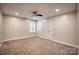 Spacious bedroom featuring a ceiling fan, double door closet, and neutral color paint at 3675 West Bay Dr, Sherrills Ford, NC 28673