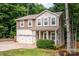 Charming two-story home with a welcoming front porch and well-maintained landscaping at 3675 West Bay Dr, Sherrills Ford, NC 28673