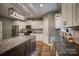 Bright kitchen with stainless steel appliances, a large center island, and granite countertops at 3675 West Bay Dr, Sherrills Ford, NC 28673