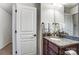 Well-lit bathroom features granite vanity and white door at 4224 Park South Station Blvd, Charlotte, NC 28210