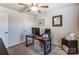 Bedroom with ceiling fan, desk with computer, and a window at 4224 Park South Station Blvd, Charlotte, NC 28210
