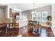 Bright dining area with a modern table set and bar seating at 4224 Park South Station Blvd, Charlotte, NC 28210