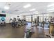 Well-equipped community gym with treadmills, ellipticals, weights, and ample natural light for workouts at 4224 Park South Station Blvd, Charlotte, NC 28210