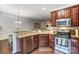 Well-equipped kitchen with stainless steel appliances, granite counters, and ample cabinet space at 4224 Park South Station Blvd, Charlotte, NC 28210