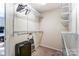 A view of a walk-in closet with wire rack shelving and a suitcase at 4224 Park South Station Blvd, Charlotte, NC 28210
