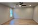 Spacious bedroom featuring a ceiling fan and natural light from the window, providing a comfortable and airy atmosphere at 44389 Us 52 N Hwy, Richfield, NC 28137