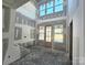 Foyer under construction featuring high ceilings, a front door, and large windows for plenty of light at 44389 Us 52 N Hwy, Richfield, NC 28137