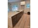 Open kitchen with a large island, plenty of countertop space, modern cabinets and natural light at 44389 Us 52 N Hwy, Richfield, NC 28137
