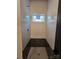 Modern shower with custom tiled walls and mosaic tile flooring, providing a luxurious and stylish showering experience at 44389 Us 52 N Hwy, Richfield, NC 28137