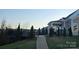 A nicely landscaped back yard with a walkway and fence is perfect for Gathering time at 5041 Wakehurst St, Kannapolis, NC 28081
