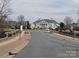 Elegant clubhouse with stately columns and well-maintained landscaping in a beautiful community at 5041 Wakehurst St, Kannapolis, NC 28081