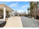 Extensive outdoor living space with a covered patio, wooden deck, and seating areas, ideal for relaxation at 5041 Wakehurst St, Kannapolis, NC 28081
