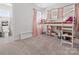 Cheerful bedroom featuring neutral carpet, bright windows, and a cute lofted bed at 518 Palmarosa St, Fort Mill, SC 29715