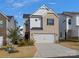 Charming two-story home with a brick facade and two-car garage at 518 Palmarosa St, Fort Mill, SC 29715