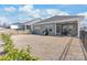 The backyard features a screened in porch, black metal fence and dry dormant grass at 5367 Turtle Creek Dr, Denver, NC 28037
