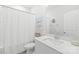 Bathroom features a single sink vanity, quartz countertop, and tub with shower curtain at 5367 Turtle Creek Dr, Denver, NC 28037