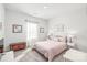 Bright bedroom features a large window, carpet, and is decorated with artwork at 5367 Turtle Creek Dr, Denver, NC 28037